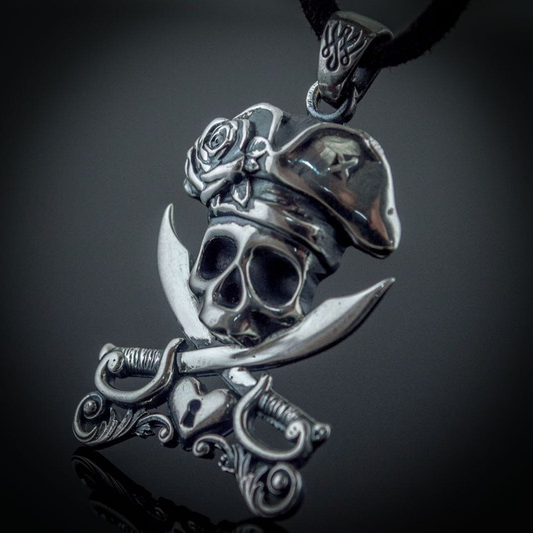 Bold Pirate skull rings, compass pendants, and anchor bracelets in antique silver and gold.