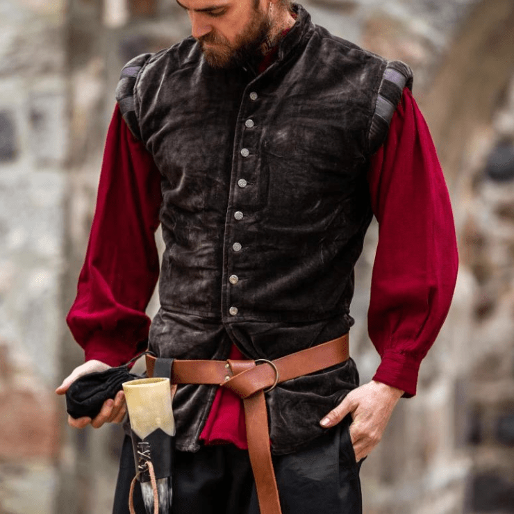 Brown velvet sleeveless Pirate vest with metal buttons and puffed shoulders worn over a red shirt.