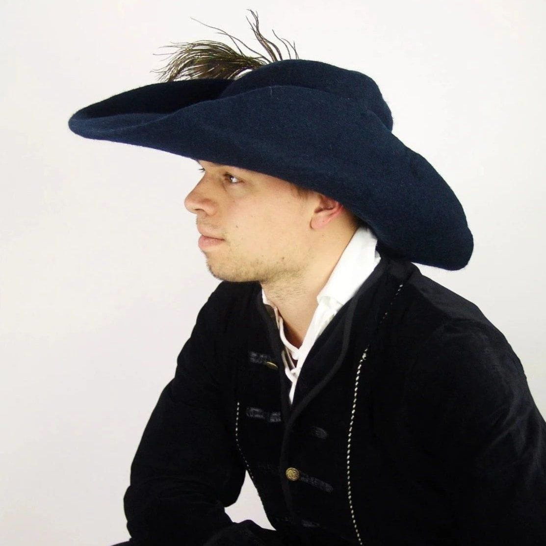 Black felted wool Pirate hat with a cocked brim and decorative feather.