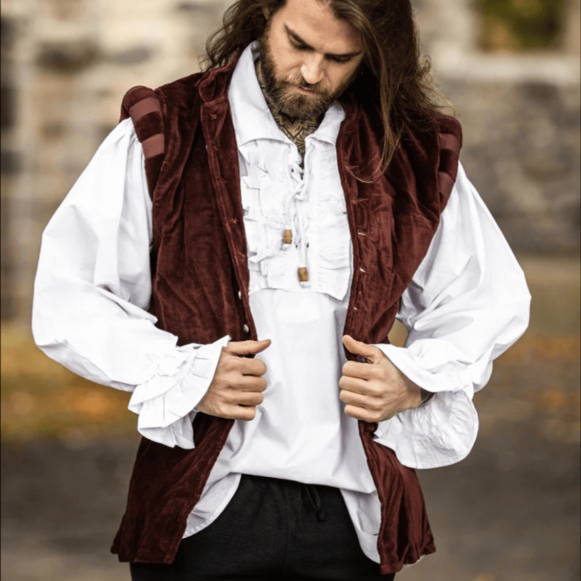 Dark red velvet Pirate vest with puffed shoulders and metal buttons over a white ruffled shirt.