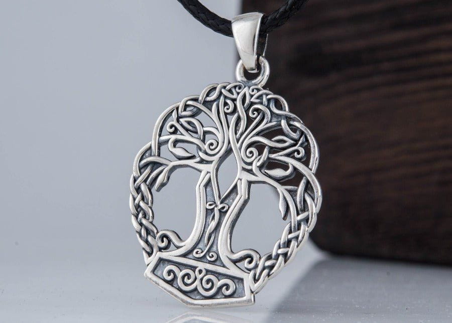 Sterling silver Pirate Yggdrasil & Mjolnir pendant, 1.25" tall, on a black cord.