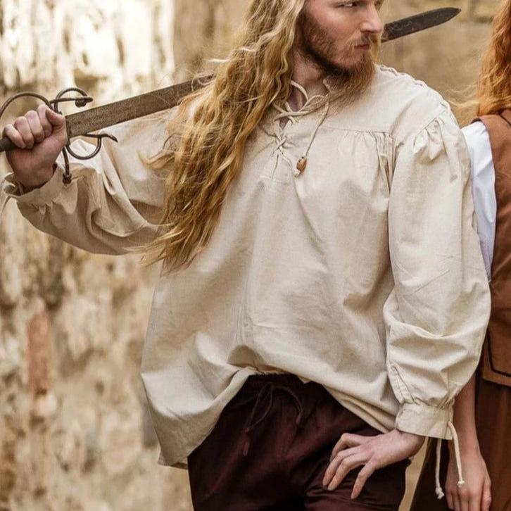 Beige cotton-linen Pirate shirt with high collar, front lace-up, and tie sleeves.