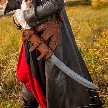 man in pirate costume with LARP sword