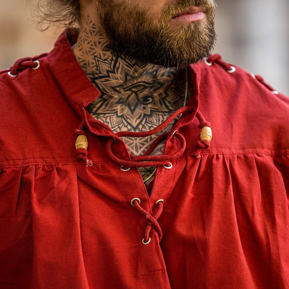 closeup on neck line - model wearing red pirate shirt with laced sleeves