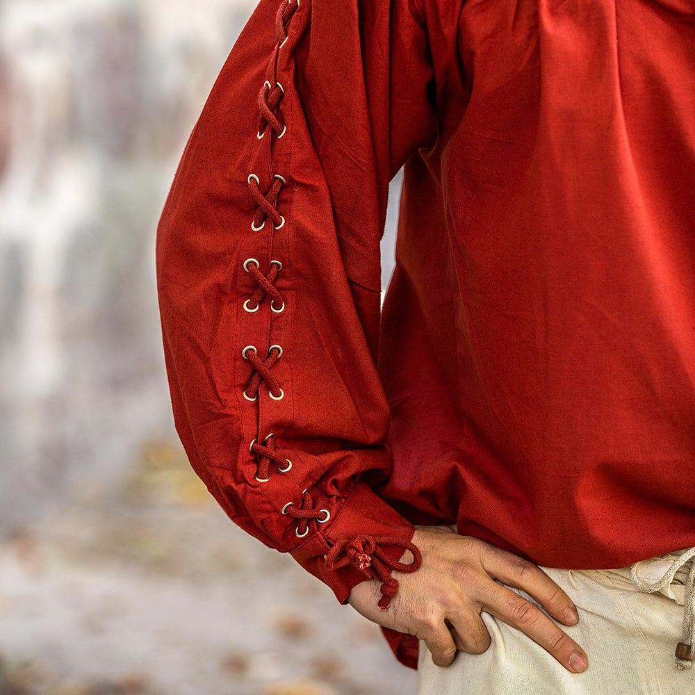 closeup laced sleeves - model wearing red pirate shirt