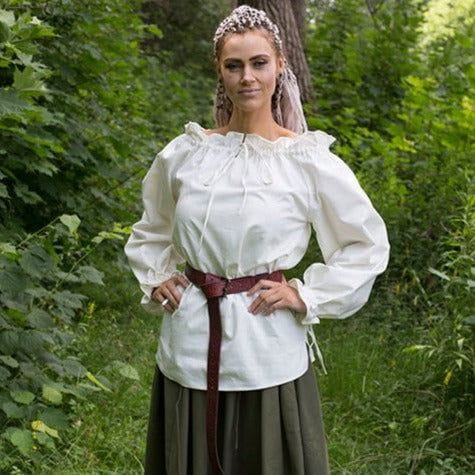 Ladies' white loose-fit Pirate cotton shirt with adjustable drawstrings at neckline and wrists, worn with a brown belt.