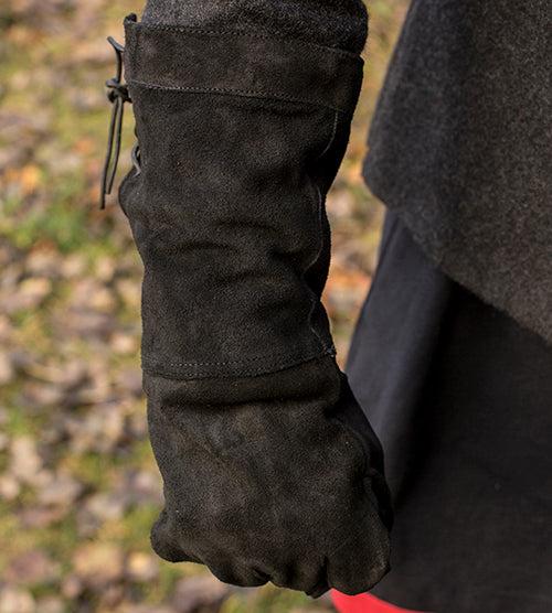 Black leather Pirate gauntlet glove with adjustable drawstring cuff and brass eyelets.