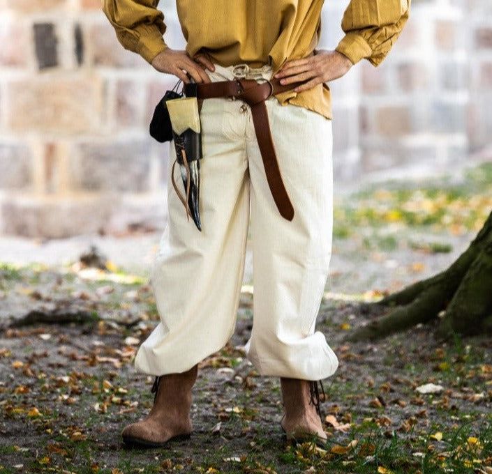 Cream natural cotton Pirate pants with lace-up front and buttoned ankle cuffs.