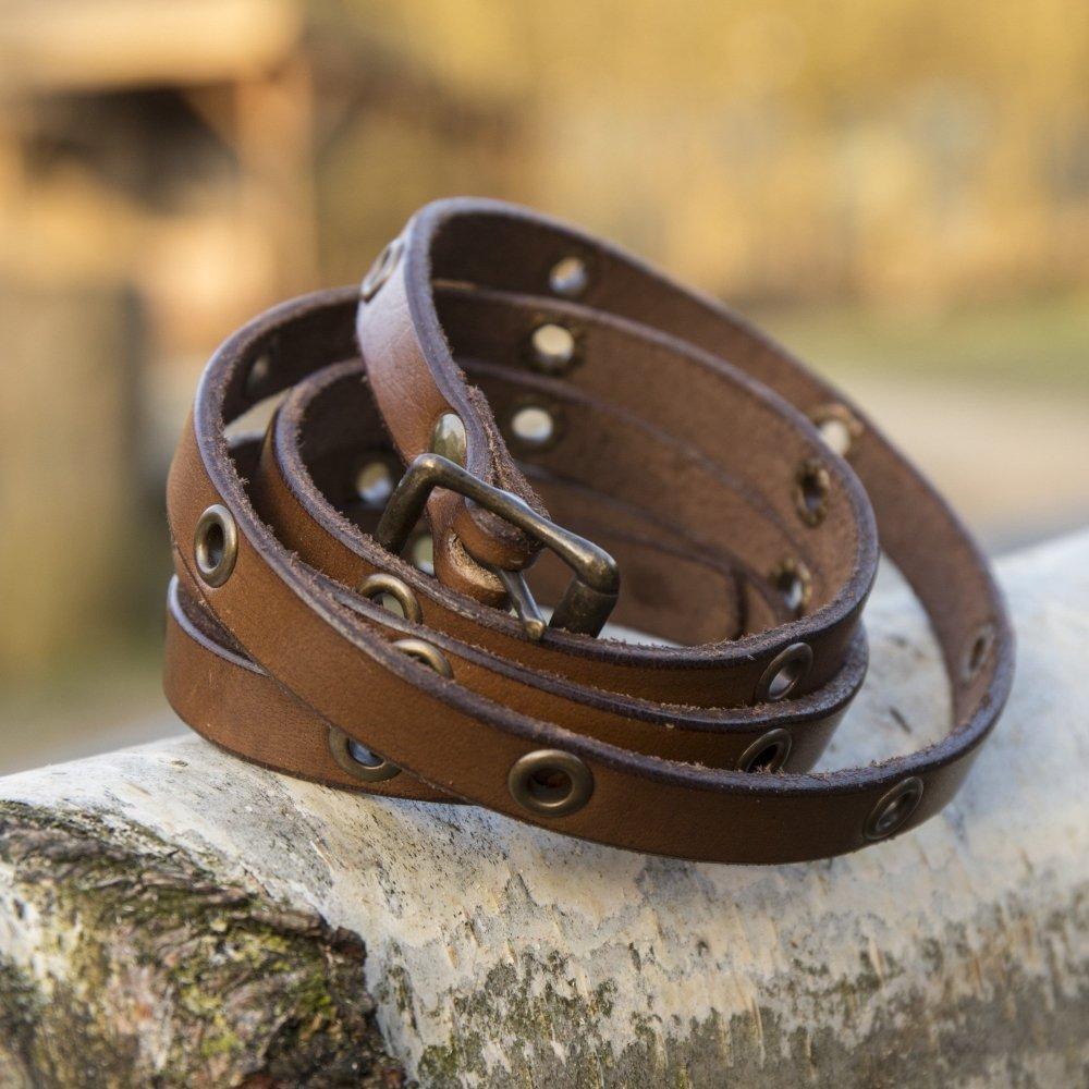 Brown genuine leather multistrap Pirate bracelet with brass hardware and adjustable buckle closure.