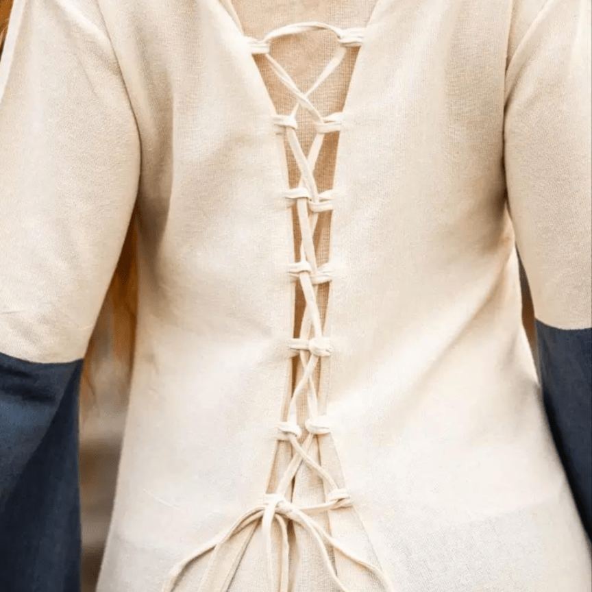 Natural and blue cotton Pirate dress with long sleeves and authentic laced back detail.