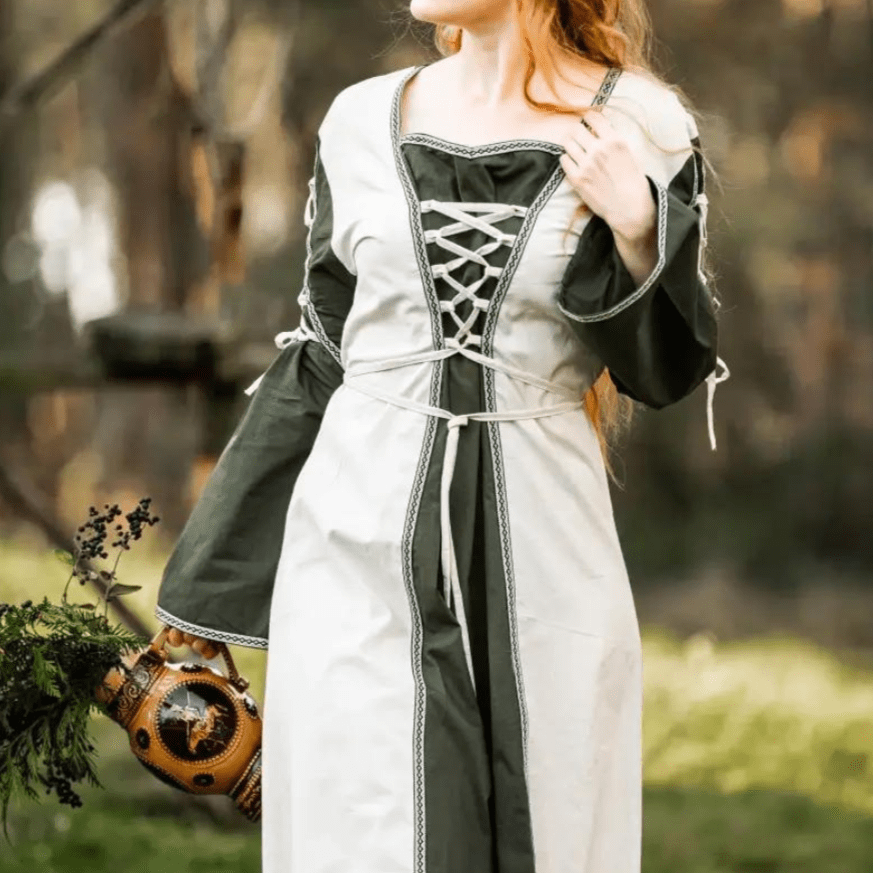 Natural and green Pirate gown with laced V-neck, trumpet sleeves, and floral border.