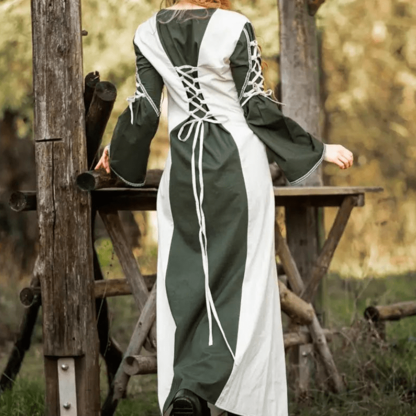 Natural and green Pirate gown with laced back, trumpet sleeves, and floral border.