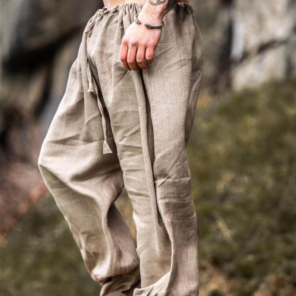 Stone color linen Pirate pants with drawstring waist and tapered, lace-up legs.