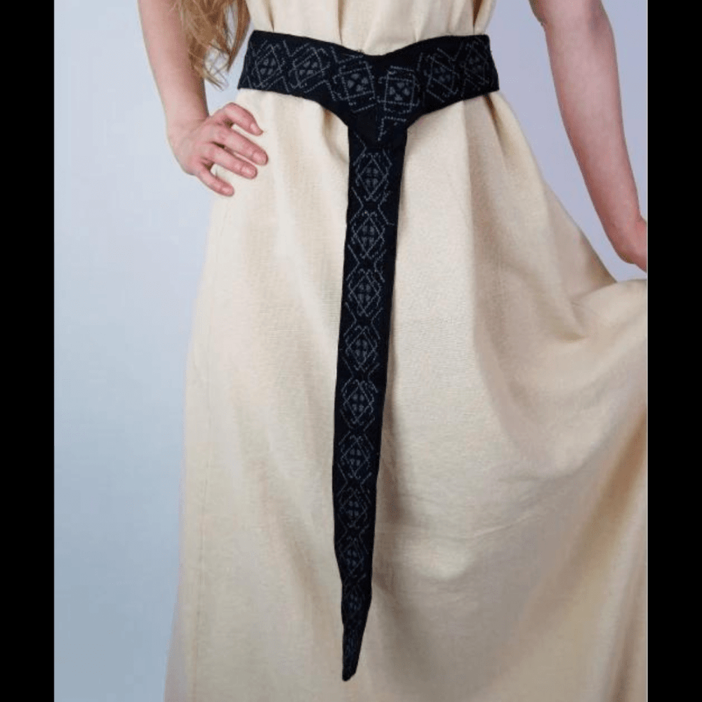 Blue Pirate sash belt with contrasting embroidery tied at the waist