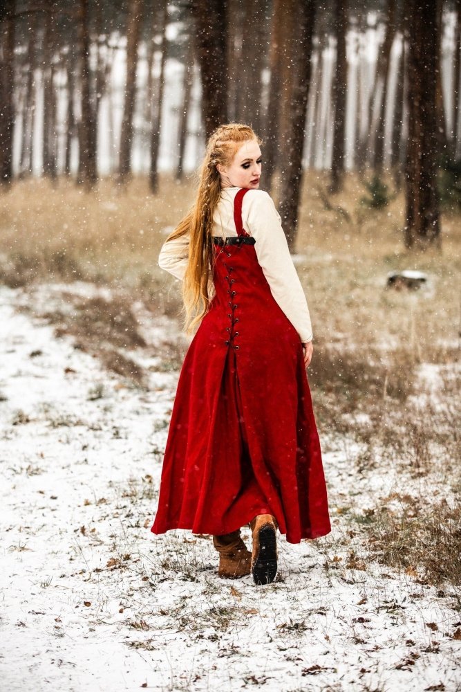 Close-up of red linen fabric on Pirate over dress