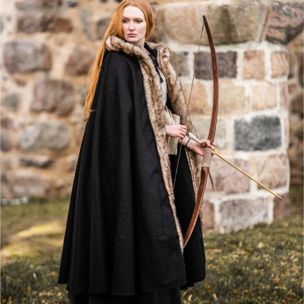Black hooded Pirate cape of heavyweight wool with luxurious faux fur trim, worn by a woman holding a bow.