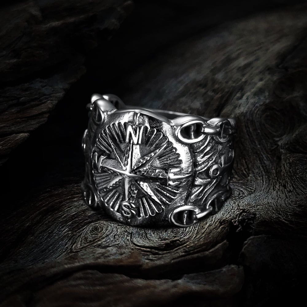 Pirate compass ring, antique silver stainless steel with detailed cardinal points and rugged finish.