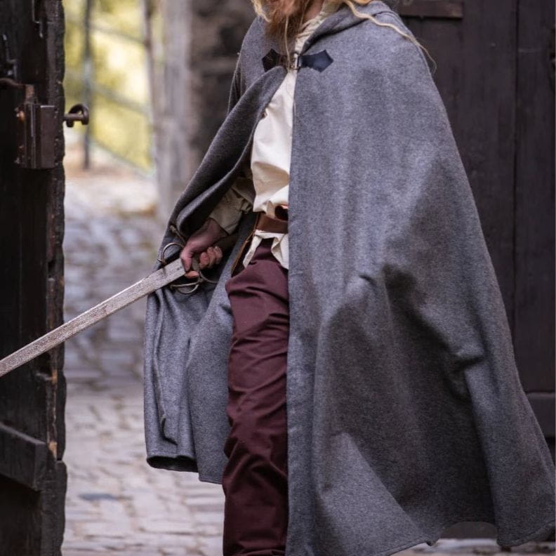 Gray wool Pirate cloak with wolf clasp, short hood, and sword.