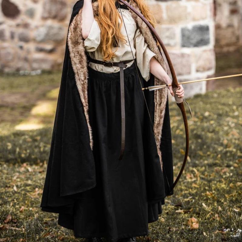 Black hooded Pirate cape made from wool blend with luxurious faux fur trim, worn by a person holding a bow.