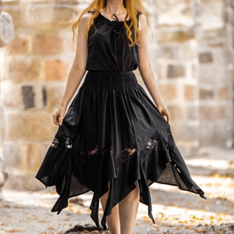 Black Pirate Skirt with elastic waistband, flowing viscose, and delicate lace panels at the hem.