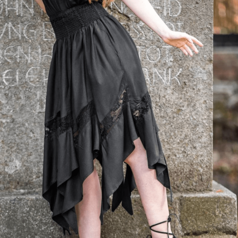 Black Pirate viscose skirt with elastic waistband and delicate lace panels at the asymmetrical hem.