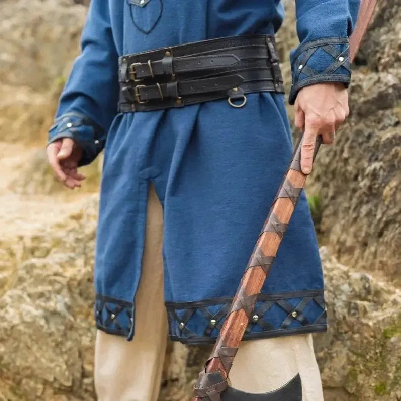Black thick leather Pirate double belt with metal rings worn over a blue tunic, holding an axe.