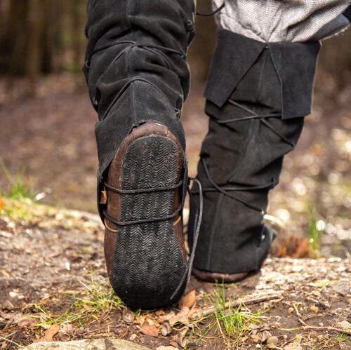 Black suede Pirate gaiters with dual lacing and under-sole straps, transforming shoes into knee-high boots.