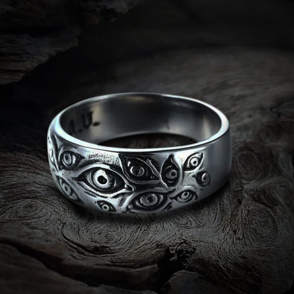 Weathered silver stainless steel Pirate ring with detailed demonic eye design.