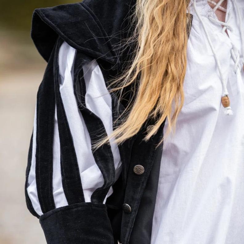 Black velvet Pirate jacket with dramatic slit puff sleeves revealing white striped fabric.