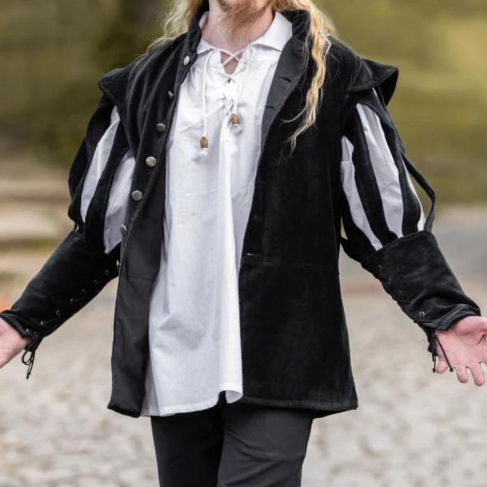 Black velvet Pirate jacket with dramatic slit puff sleeves and wooden buttons over a white shirt.