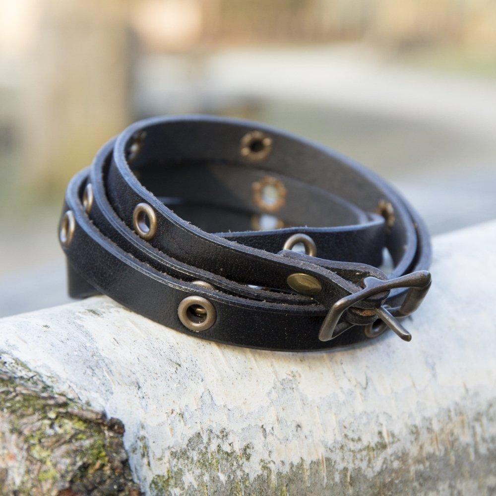 Black multistrap genuine leather Pirate bracelet with brass hardware and adjustable buckle closure.