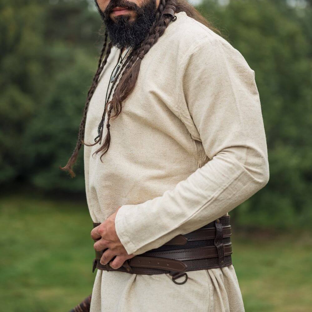 Natural linen Pirate tunic, thigh-length, with classic neckline and brown leather belt.