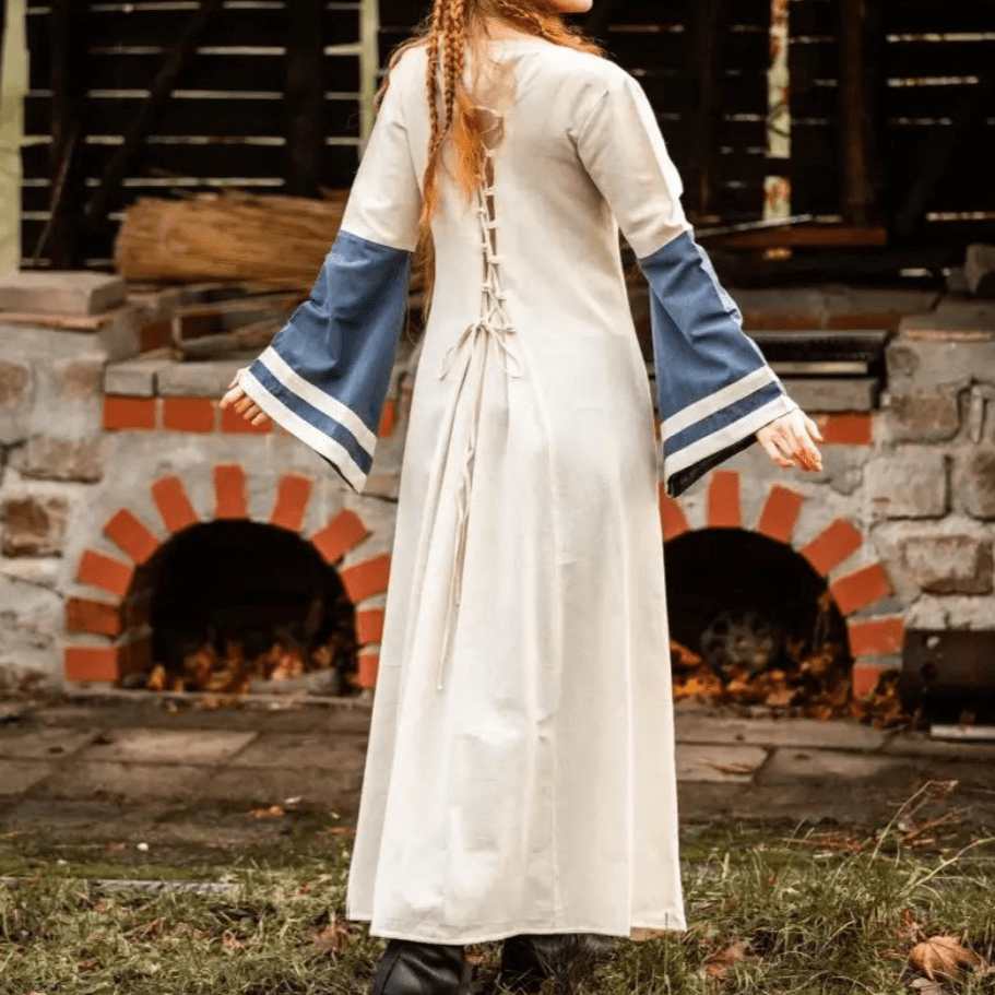 Natural and blue cotton Pirate dress with long sleeves and laced back.