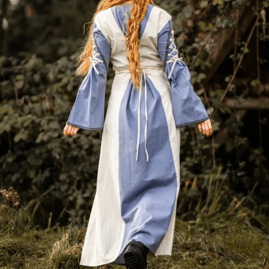 Natural and blue pirate gown with laced cuffs, open trumpet sleeves, and floral borders, seen from behind.