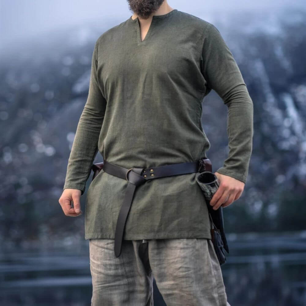Olive green linen Pirate tunic, thigh-length with a classic V-neck, worn with a belt.