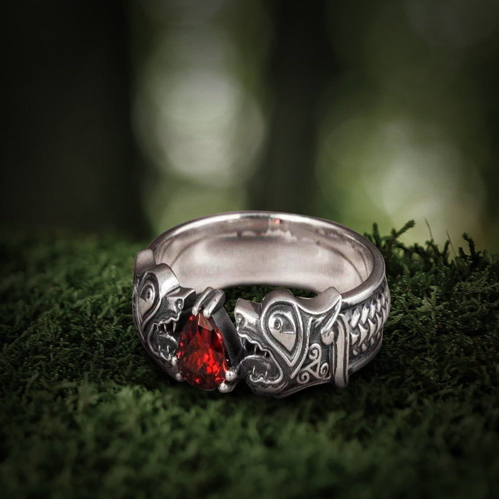 Sterling silver Pirate Fenrir wolf ring with a fierce red gemstone eye, detailed Norse design.