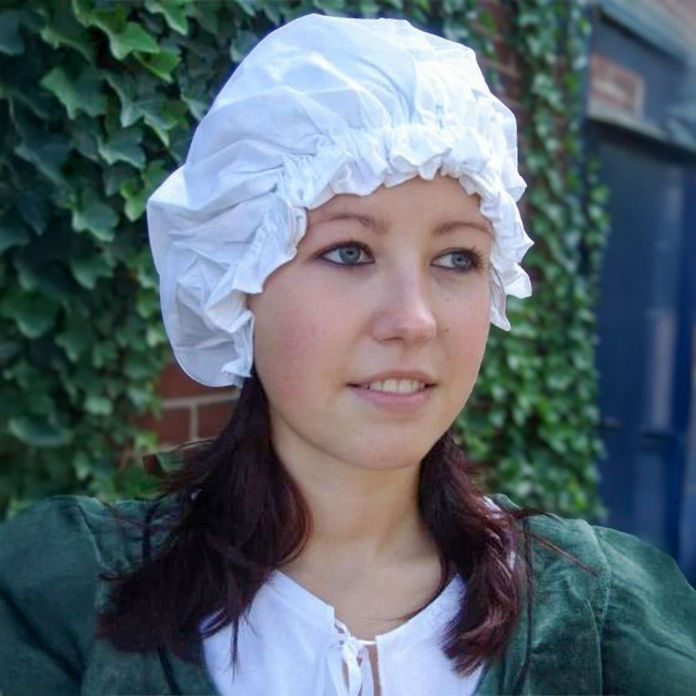 White cotton Pirate bonnet with elasticated ruffle, worn by a woman.