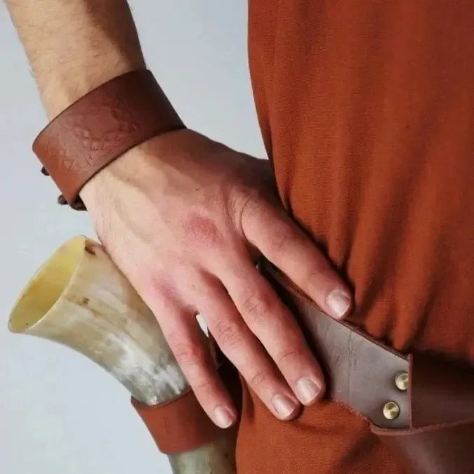 Close view of black Pirate leather cuff bracelet with embossed pattern