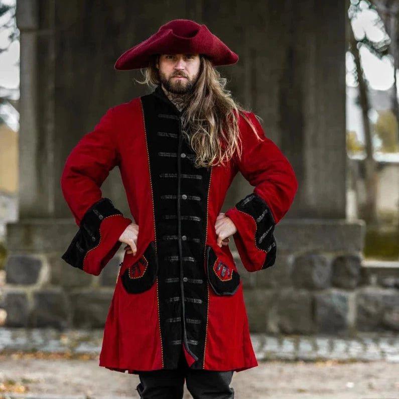 Model wearing velvet pirate coat in red with black trim