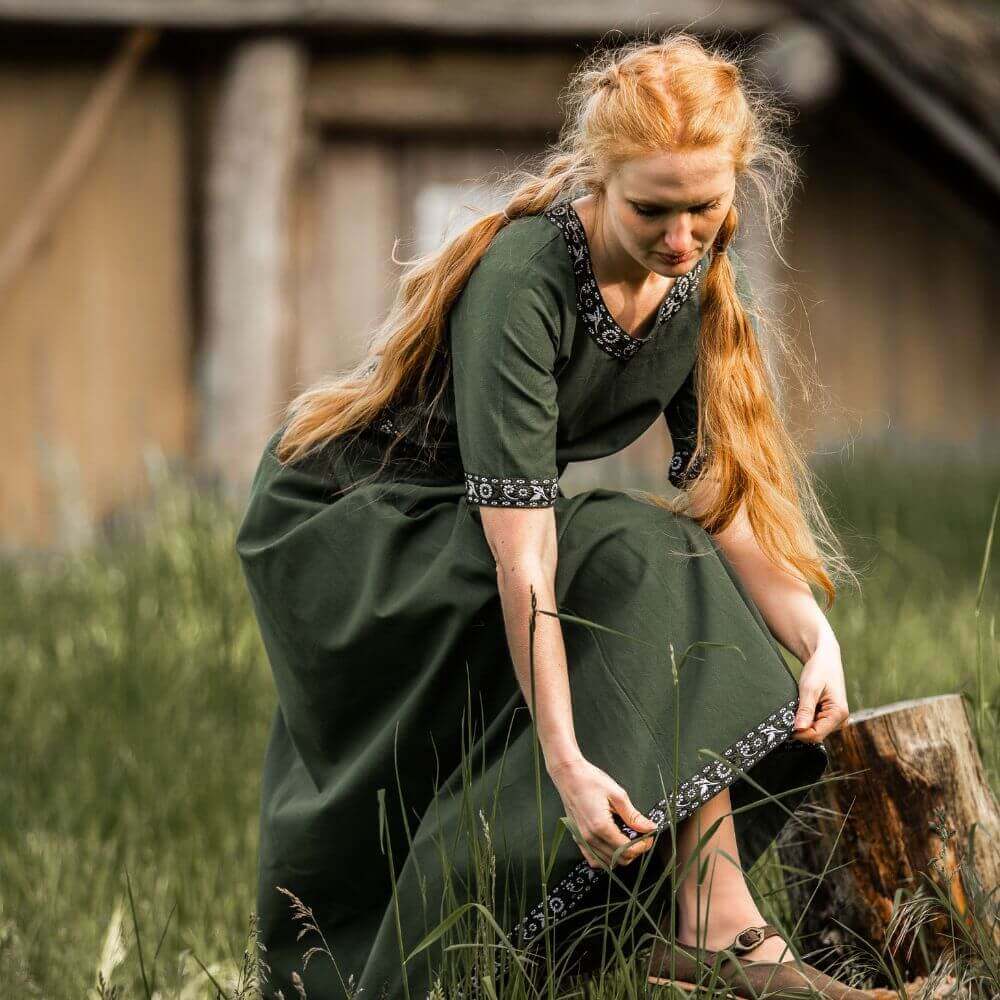 Green Pirate ladies dress shown from the front with embroidered neckline