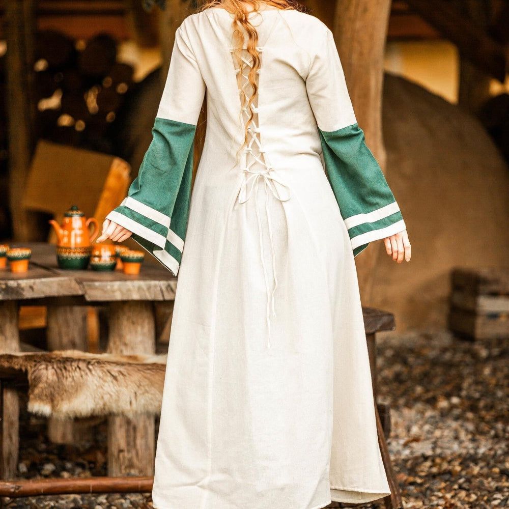 Natural and green Pirate ladies dress, side view showing the full length