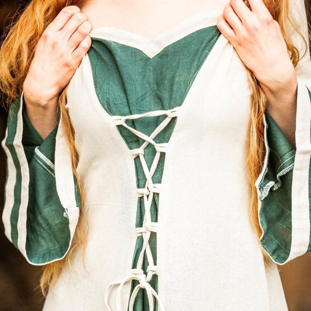 Close-up of the front lace-up closure on the natural and green Pirate dress