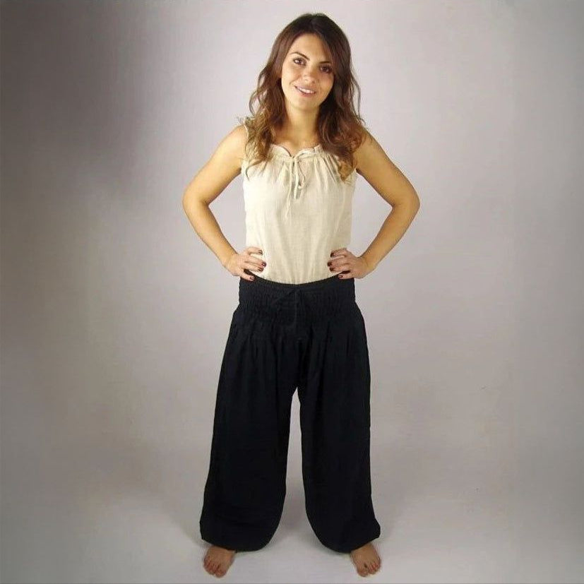 women modeling black pirate pants